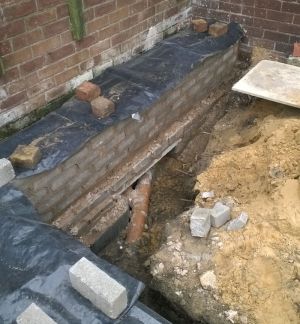 Photo showing lintels over pipework